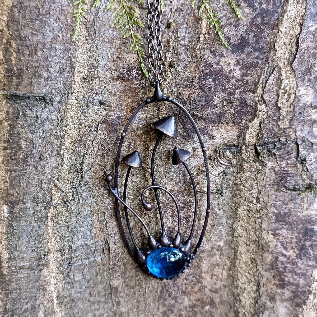 Blue Glass Mushroom Necklace – Blackened Copper Oval Forest Pendant – Botanical