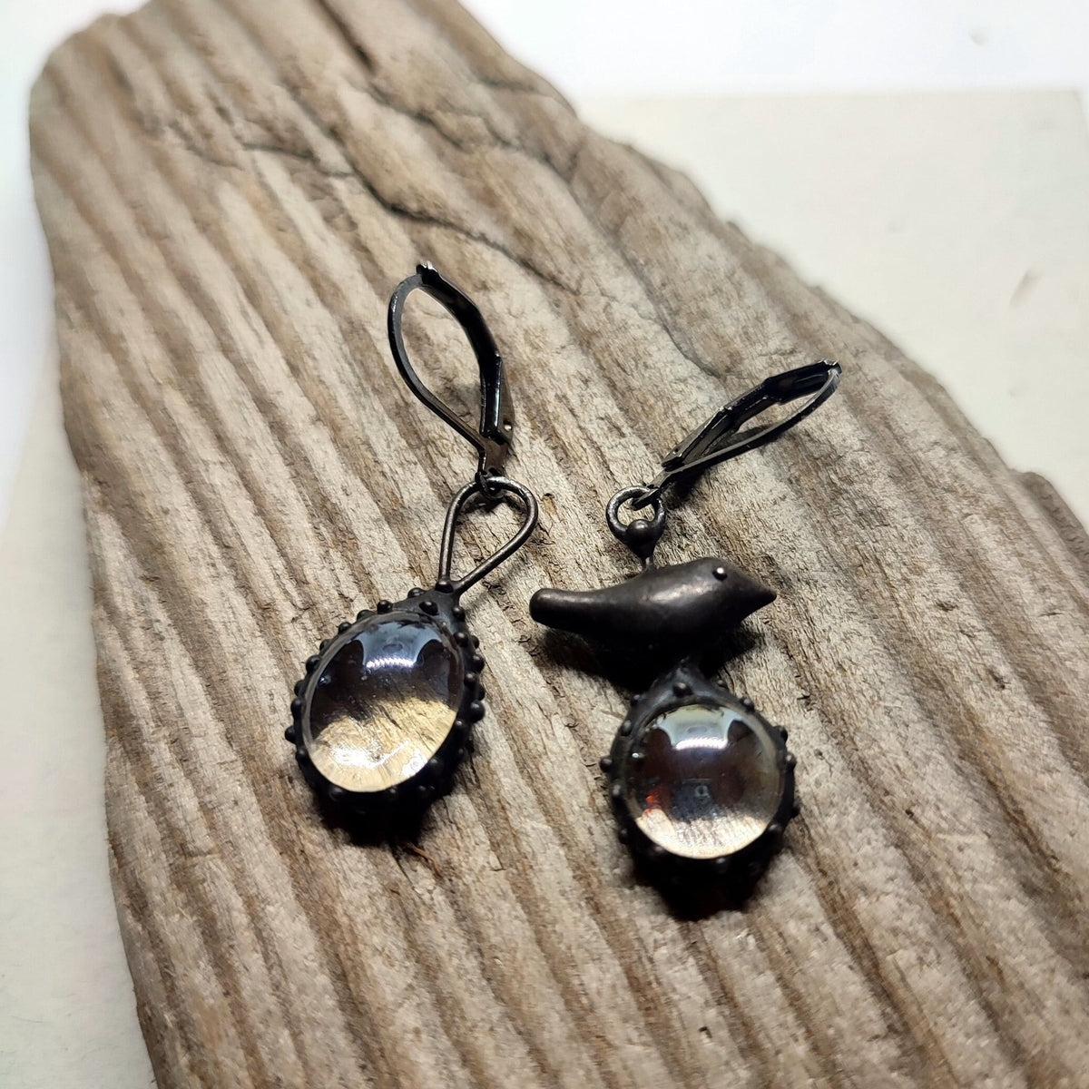 Clear Glass Asymmetrical Bird Earrings – Blackened Copper