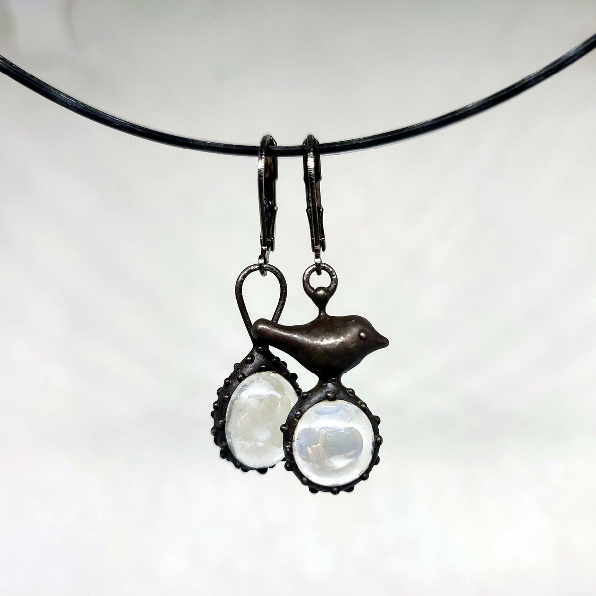 Clear Glass Asymmetrical Bird Earrings – Blackened Copper
