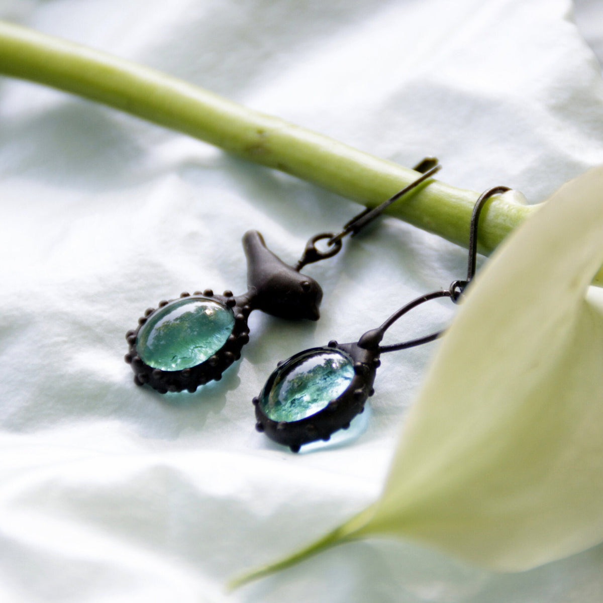 Teal Blue Glass Asymmetrical Bird Earrings – Blackened Copper