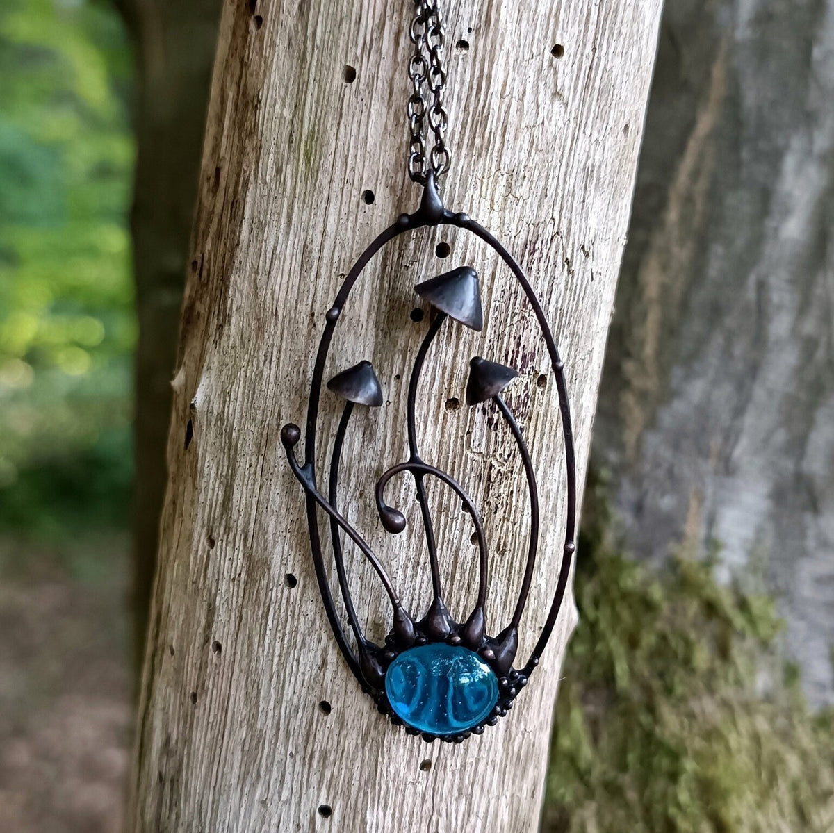 Blue Glass Mushroom Necklace – Blackened Copper Oval Forest Pendant – Botanical