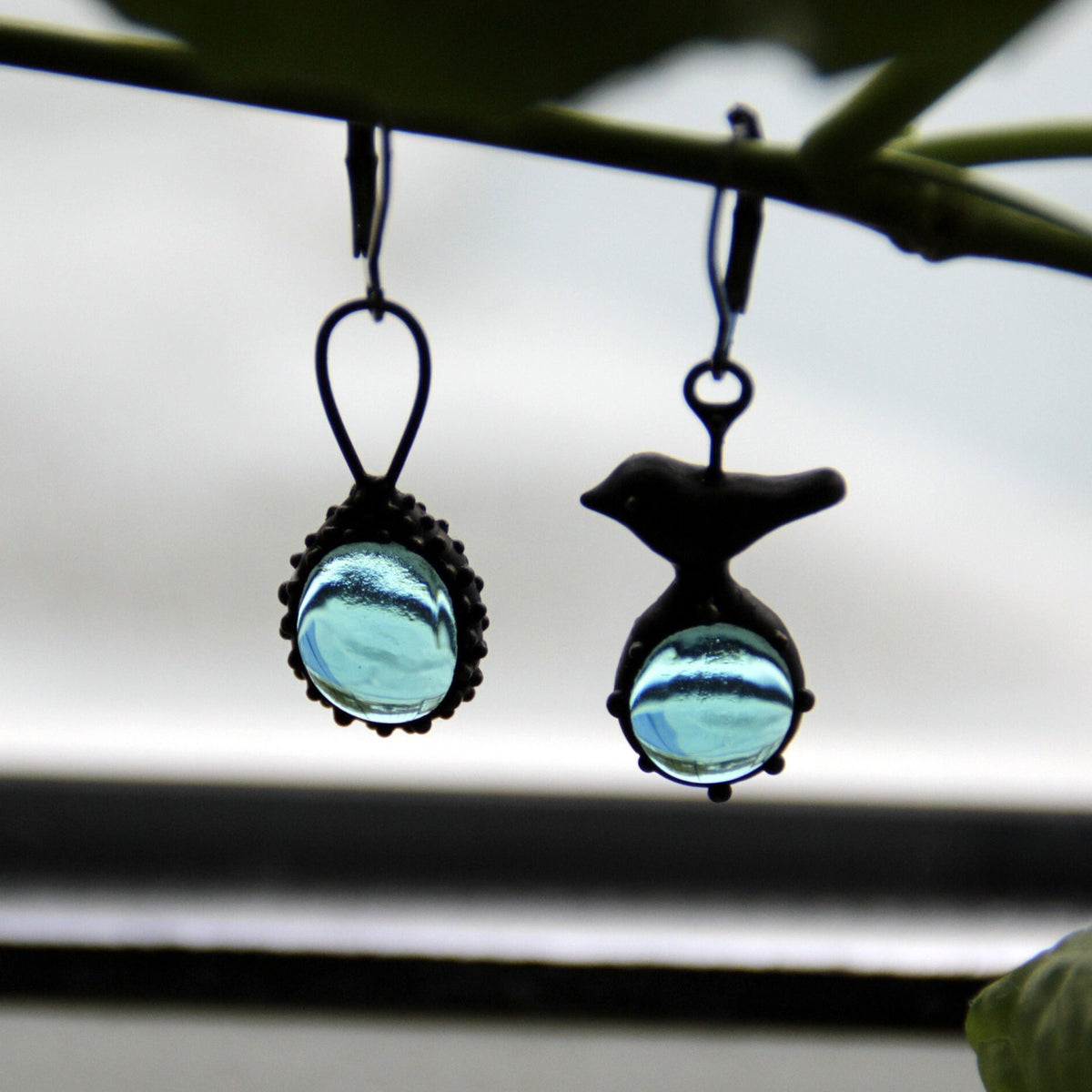 Blue Glass Asymmetrical Bird Earrings – Blackened Copper