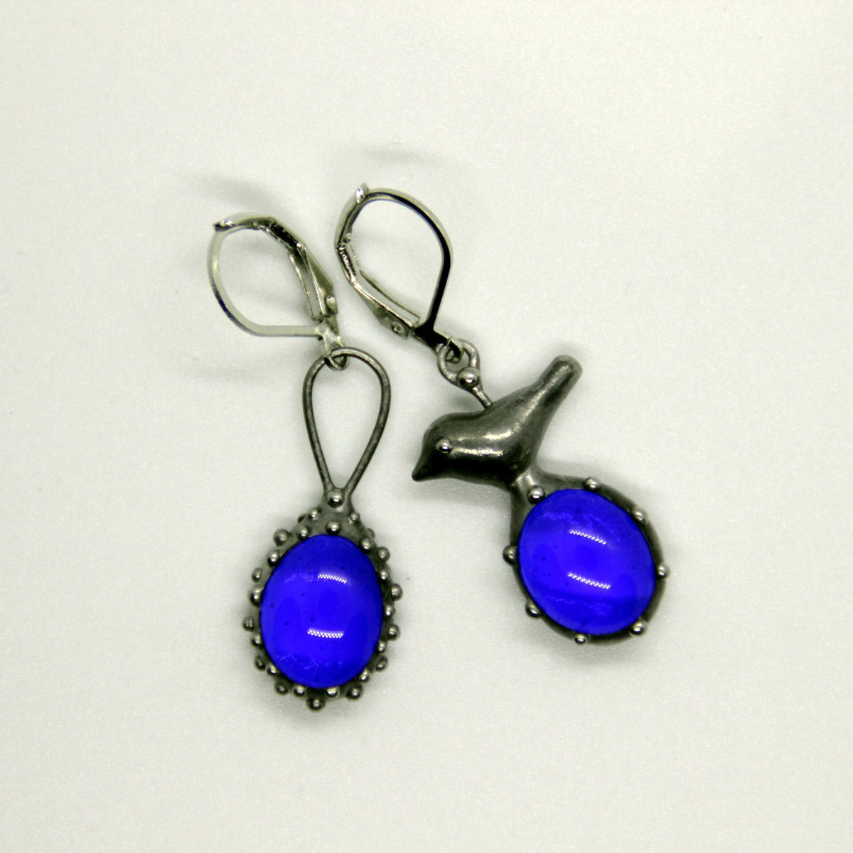 Blue Glass Asymmetrical Bird Earrings – Silver Tone