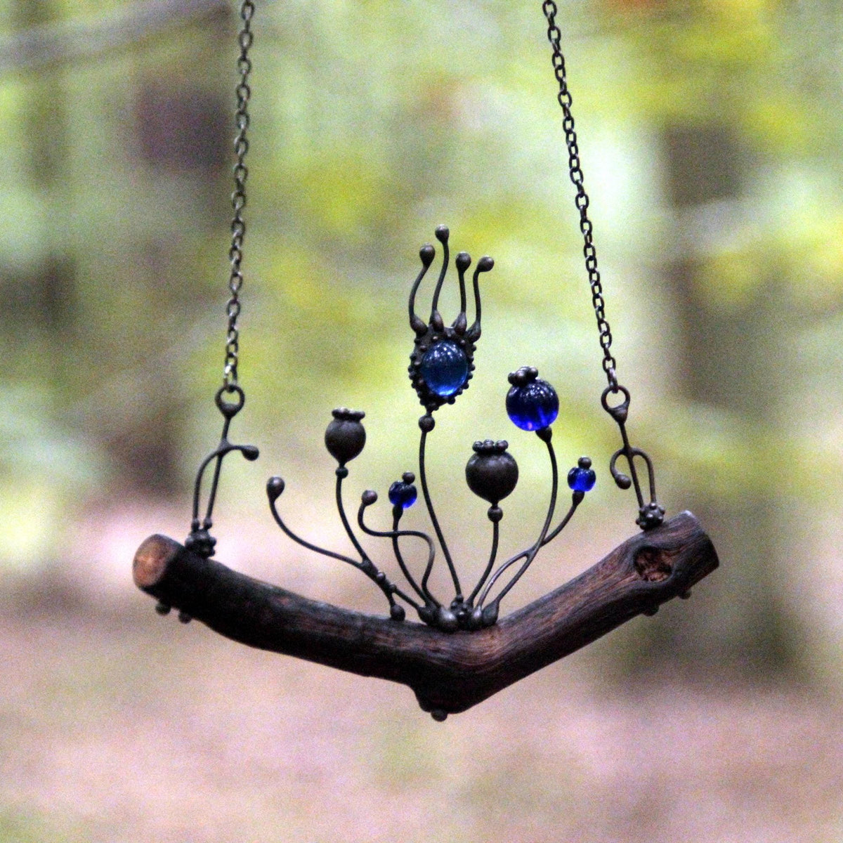 Blue Glass Poppy Necklace on Oak Branch – Blackened Copper