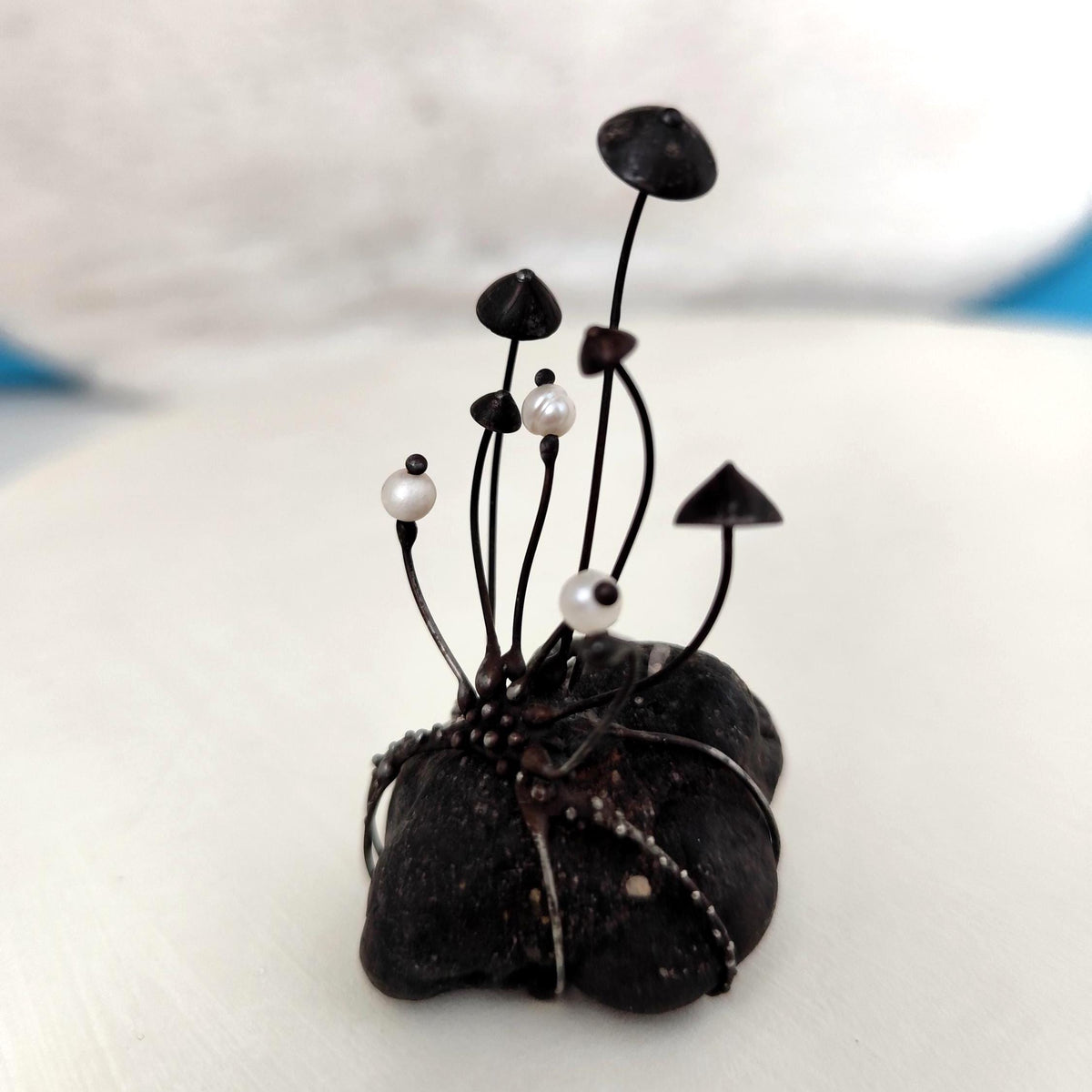 White Pearl Mushroom Sculpture on Baltic Sea Stone – Blackened Copper