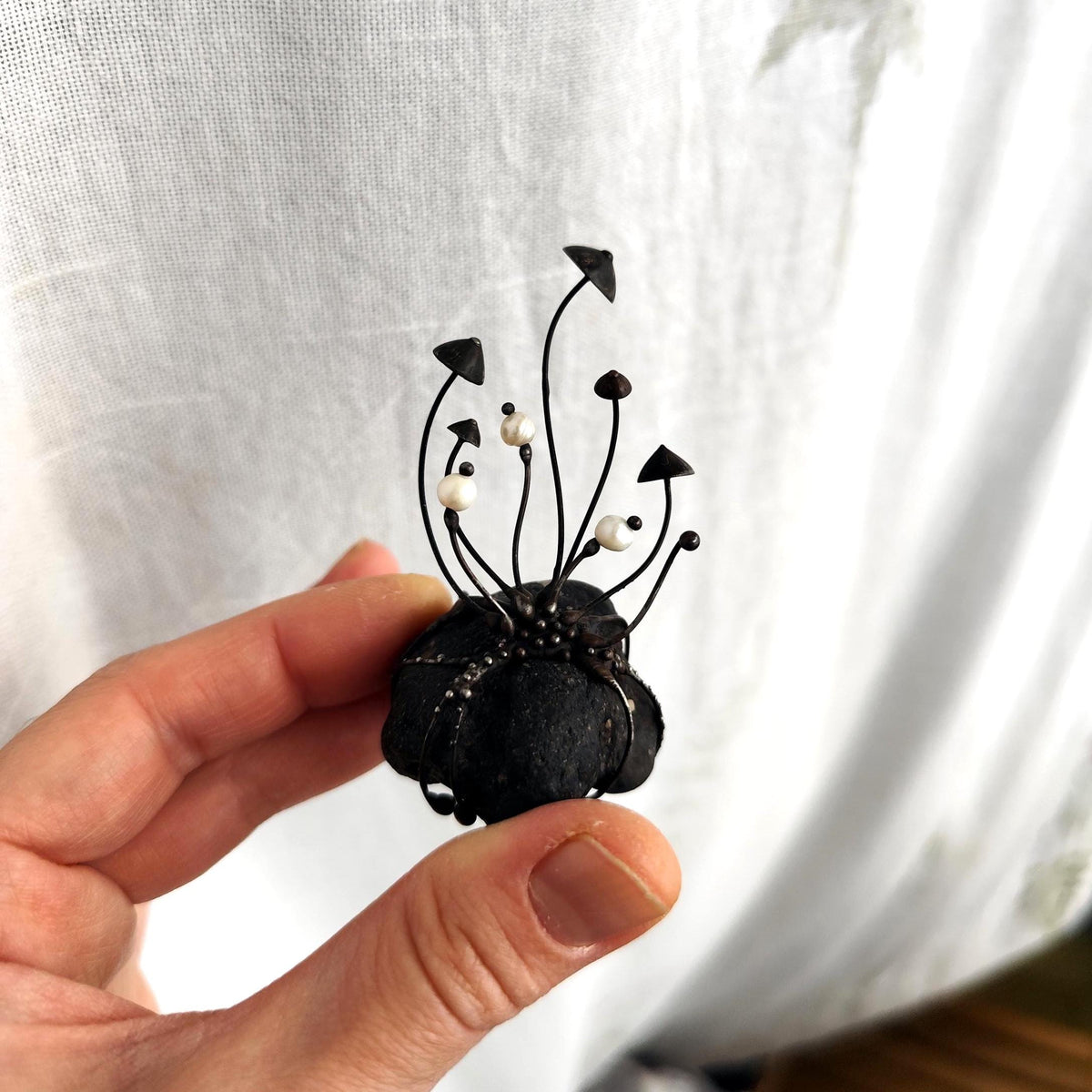 White Pearl Mushroom Sculpture on Baltic Sea Stone – Blackened Copper