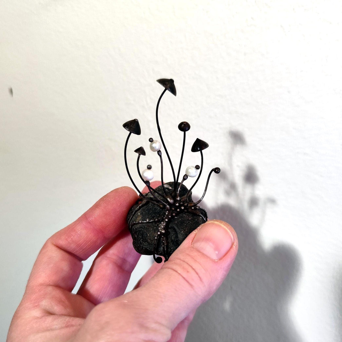 White Pearl Mushroom Sculpture on Baltic Sea Stone – Blackened Copper
