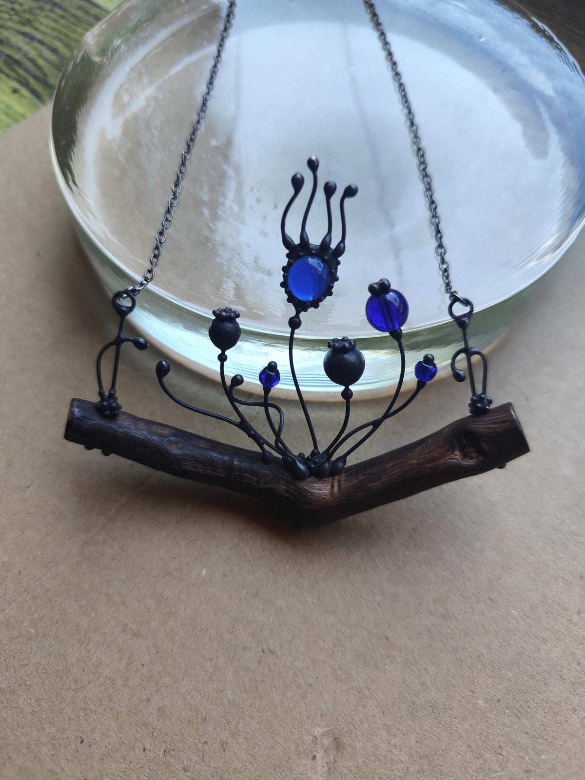 Blue Glass Poppy Necklace on Oak Branch – Blackened Copper