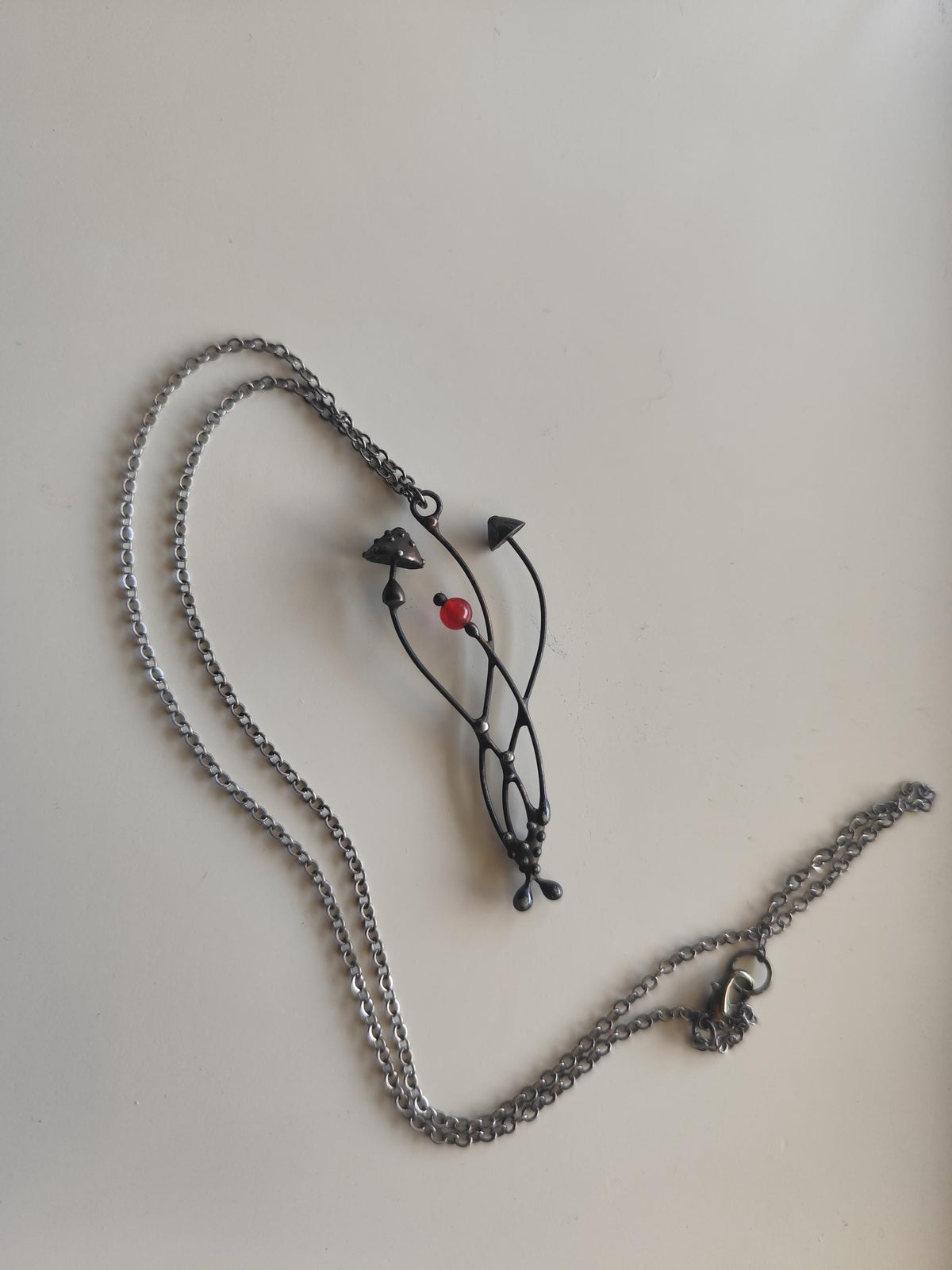 Mushroom Necklace with Red Bead – Blackened Copper