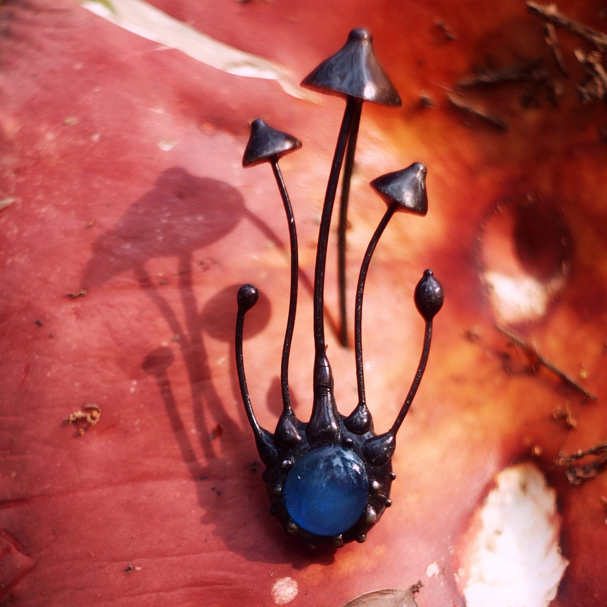Blue Glass Mushroom Trio Brooch – Blackened Copper