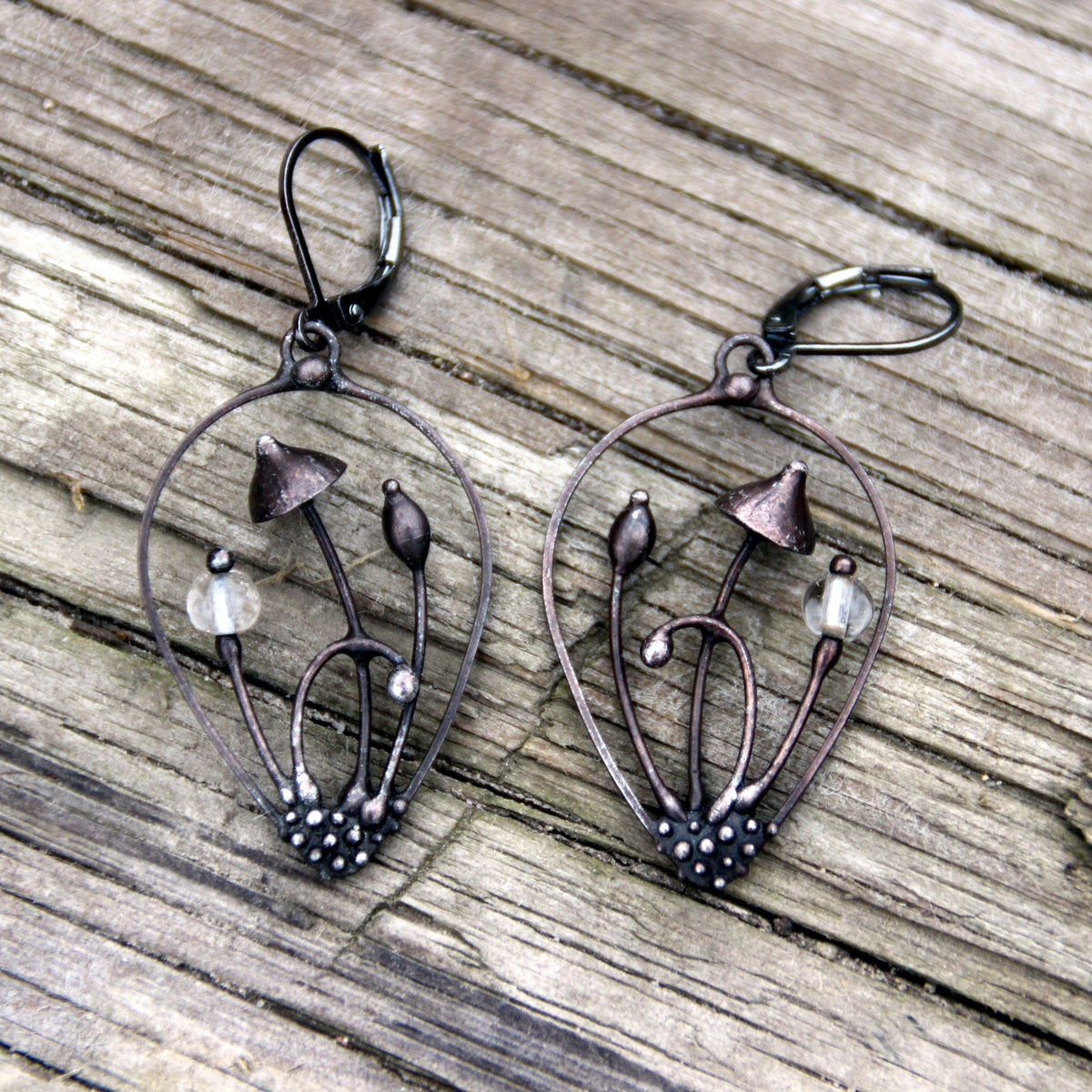 Clear Glass Mushroom Earrings – Blackened Copper Teardrop Dangles – Botanical Forest