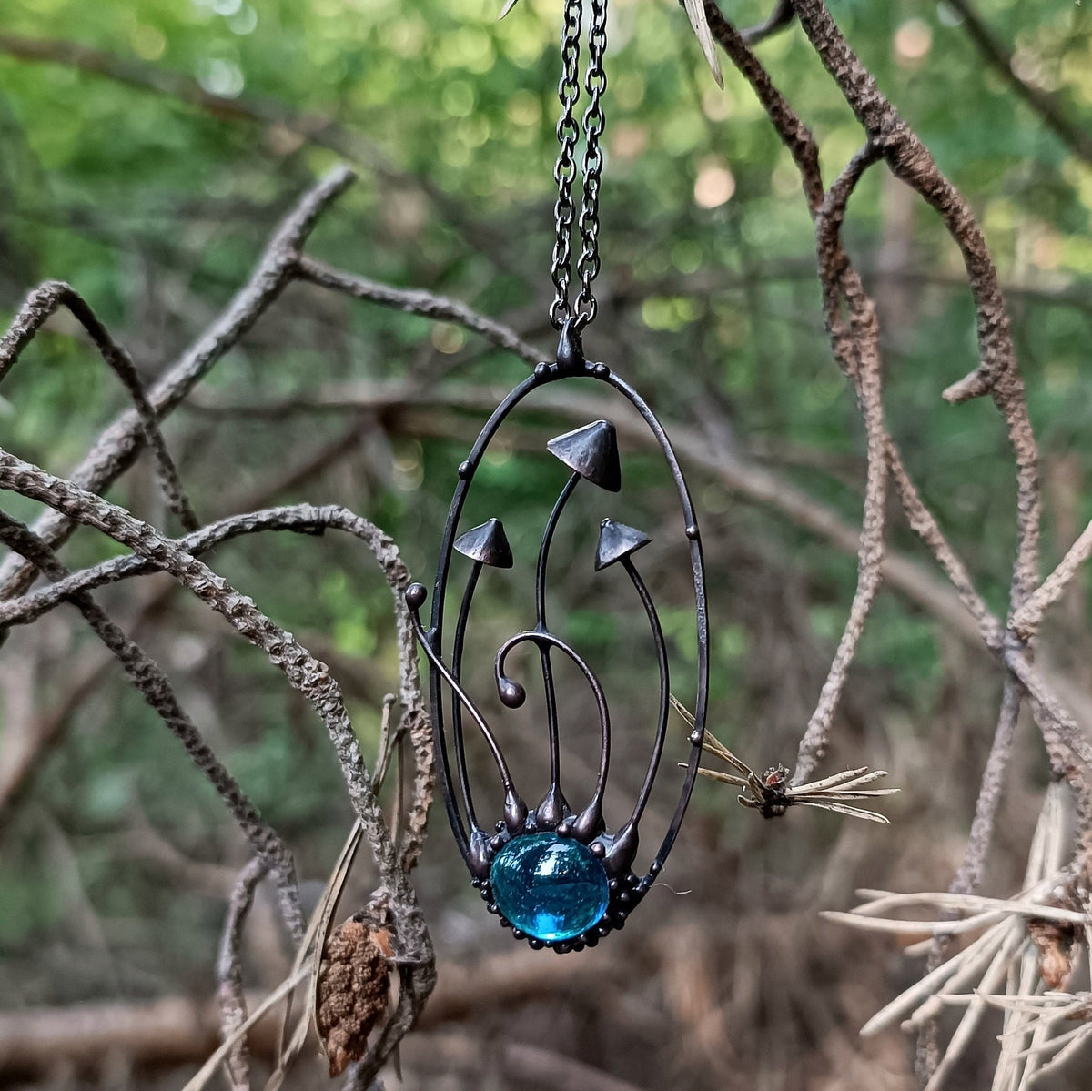 Blue Glass Mushroom Necklace – Blackened Copper Oval Forest Pendant – Botanical