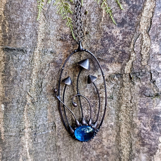 Blue Glass Mushroom Necklace – Blackened Copper Oval Forest Pendant – Botanical