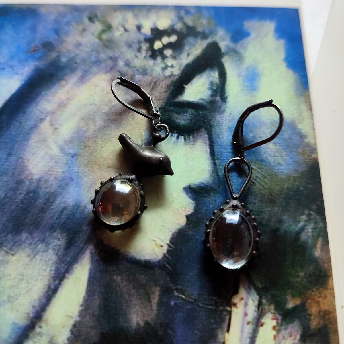 Clear Glass Asymmetrical Bird Earrings – Blackened Copper