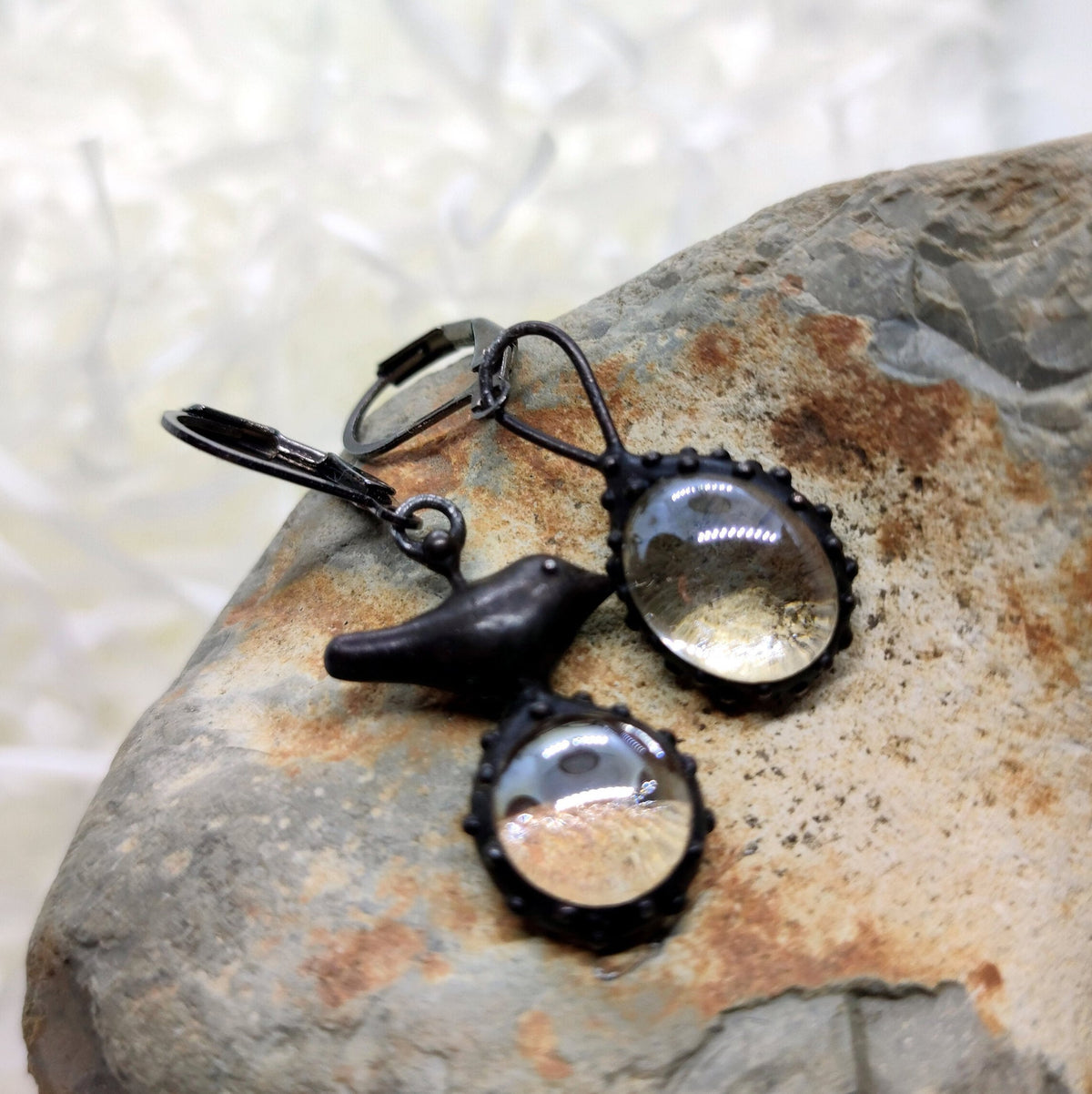 Clear Glass Asymmetrical Bird Earrings – Blackened Copper