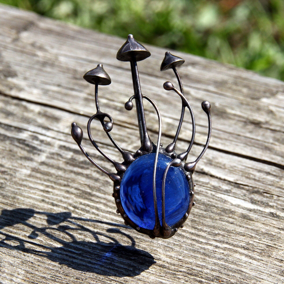 Blue Glass Mushroom Brooch – Blackened Copper