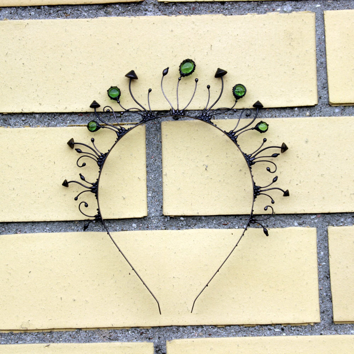 Black Mushroom Crown with Green Glass