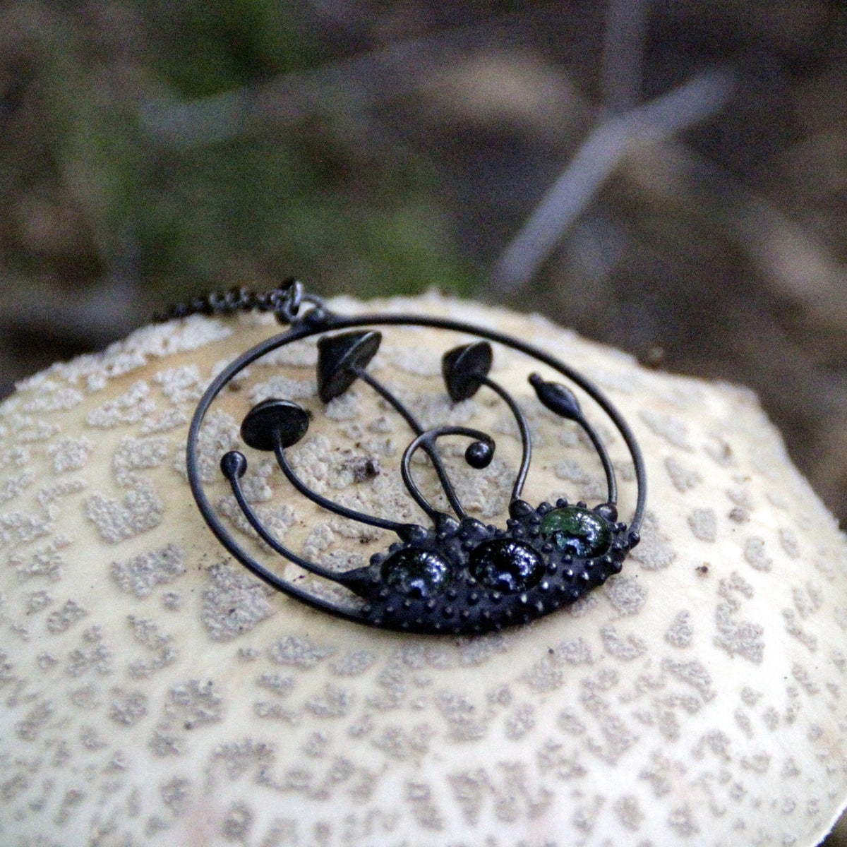 Green Glass Mushroom Necklace – Blackened Copper Round Forest Pendant – Botanical Fungi