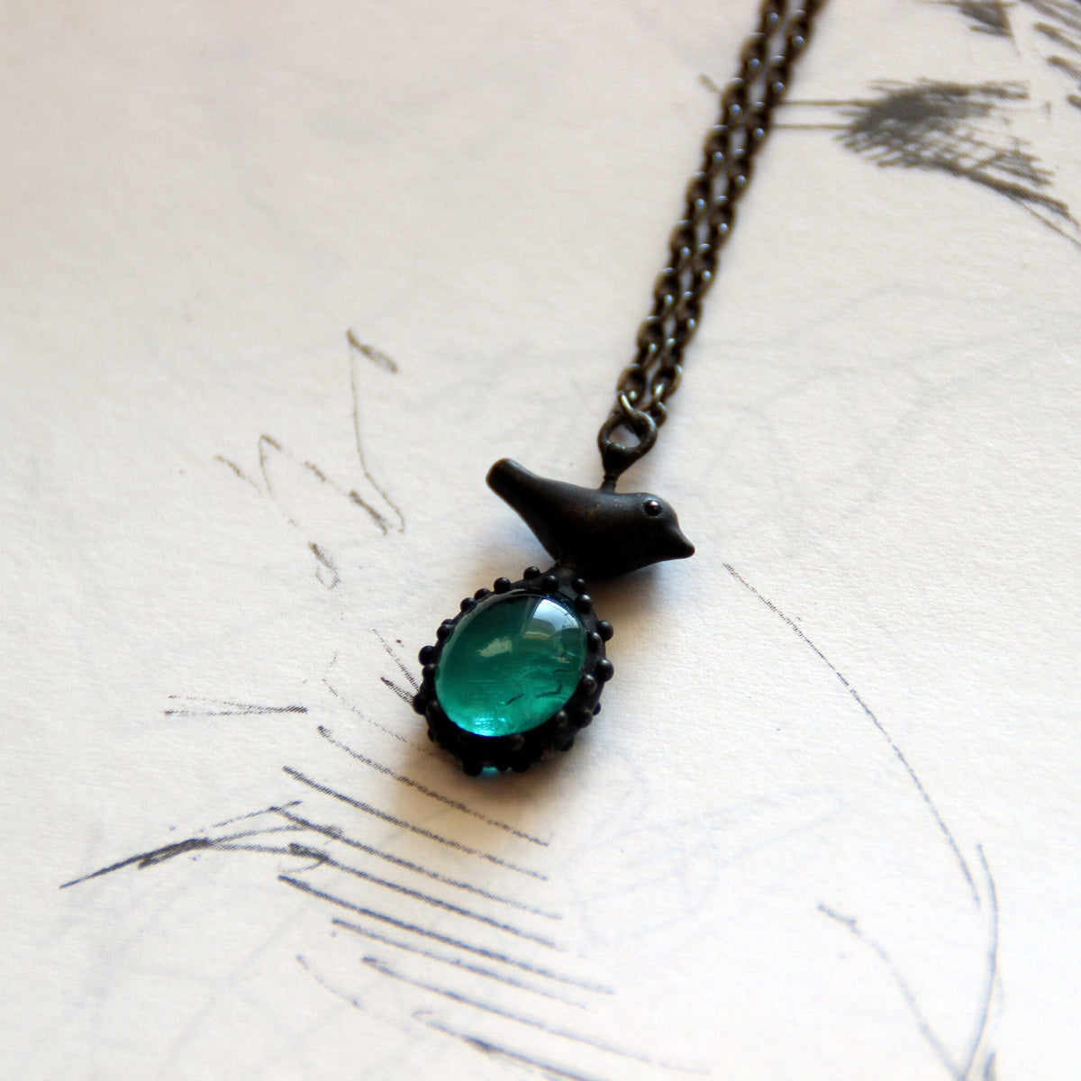 Teal Blue Glass Bird Necklace – Blackened Copper