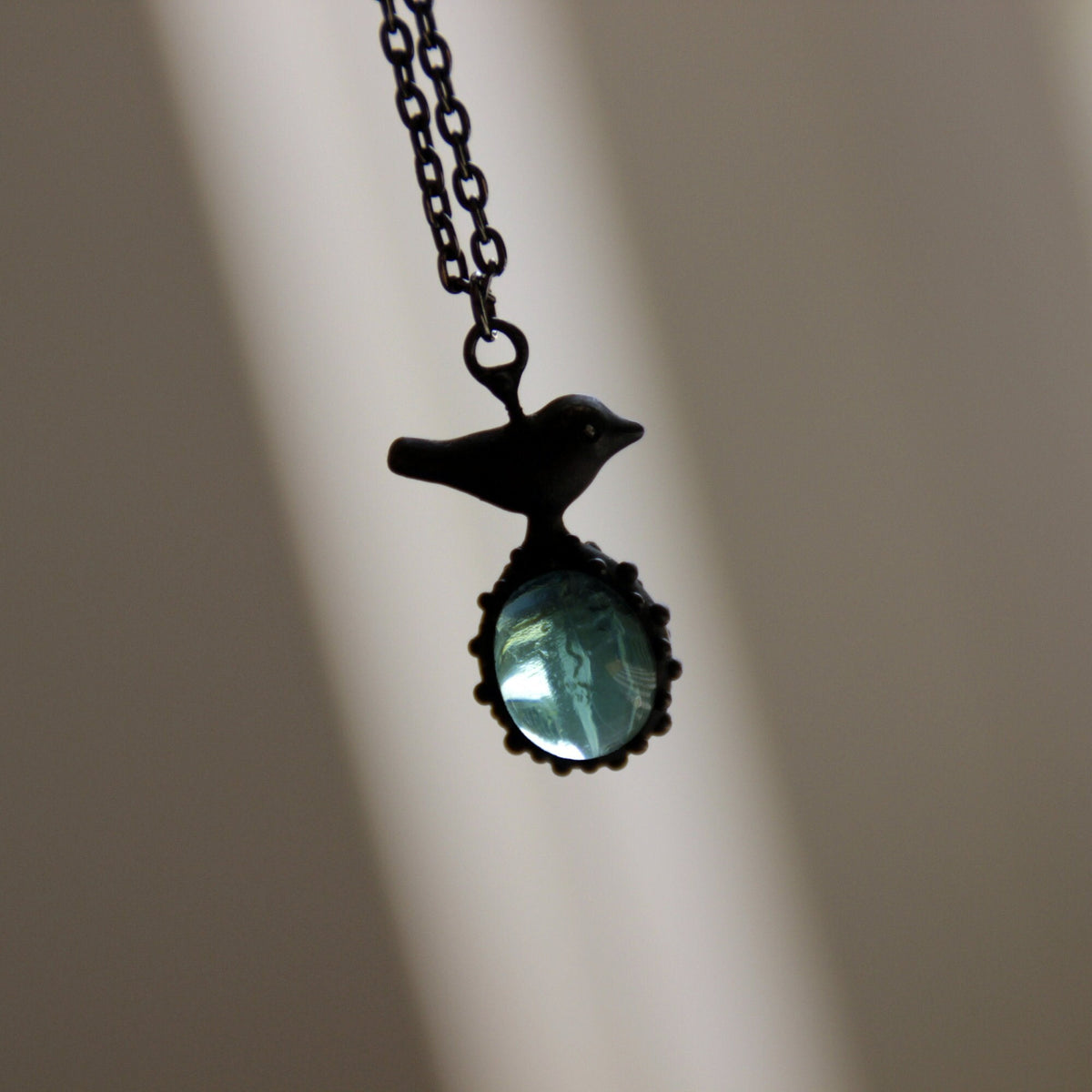 Teal Blue Glass Bird Necklace – Blackened Copper