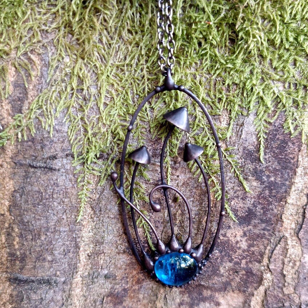 Blue Glass Mushroom Necklace – Blackened Copper Oval Forest Pendant – Botanical