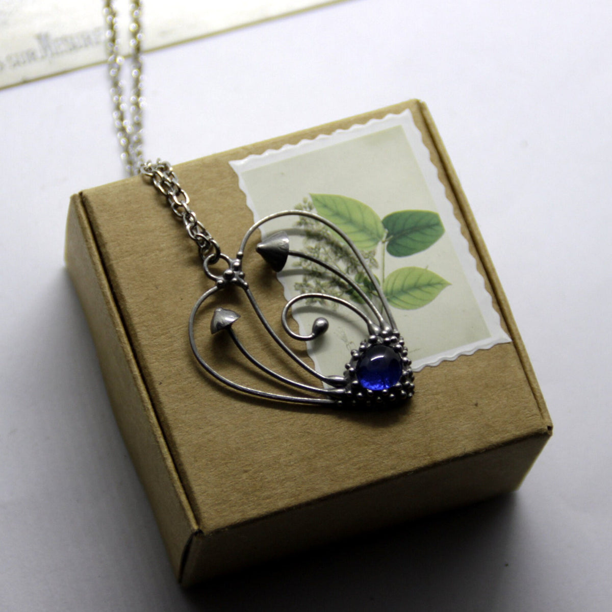 Blue Glass Mushroom Heart Necklace – Silver Tone