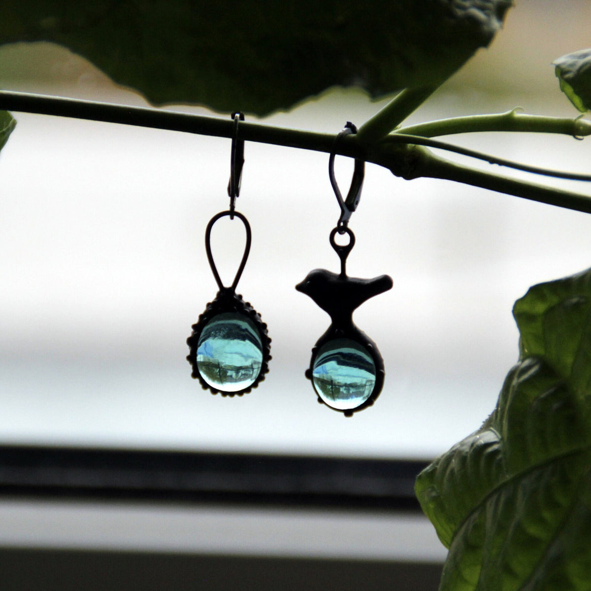 Blue Glass Asymmetrical Bird Earrings – Blackened Copper