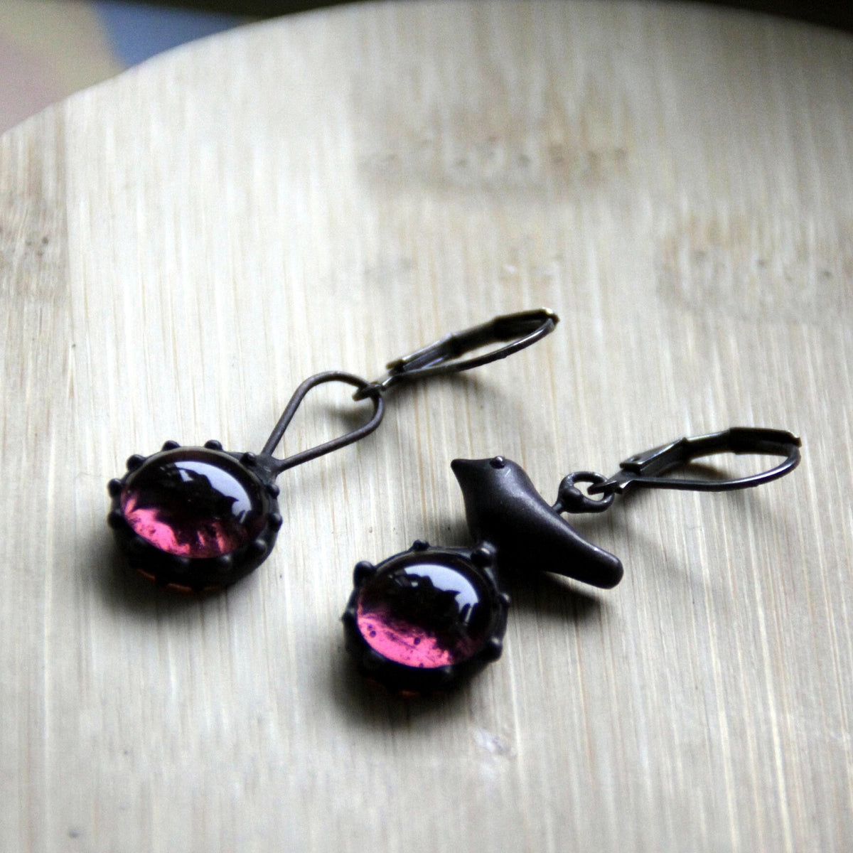 Purple Glass Asymmetrical Bird Earrings – Blackened Copper