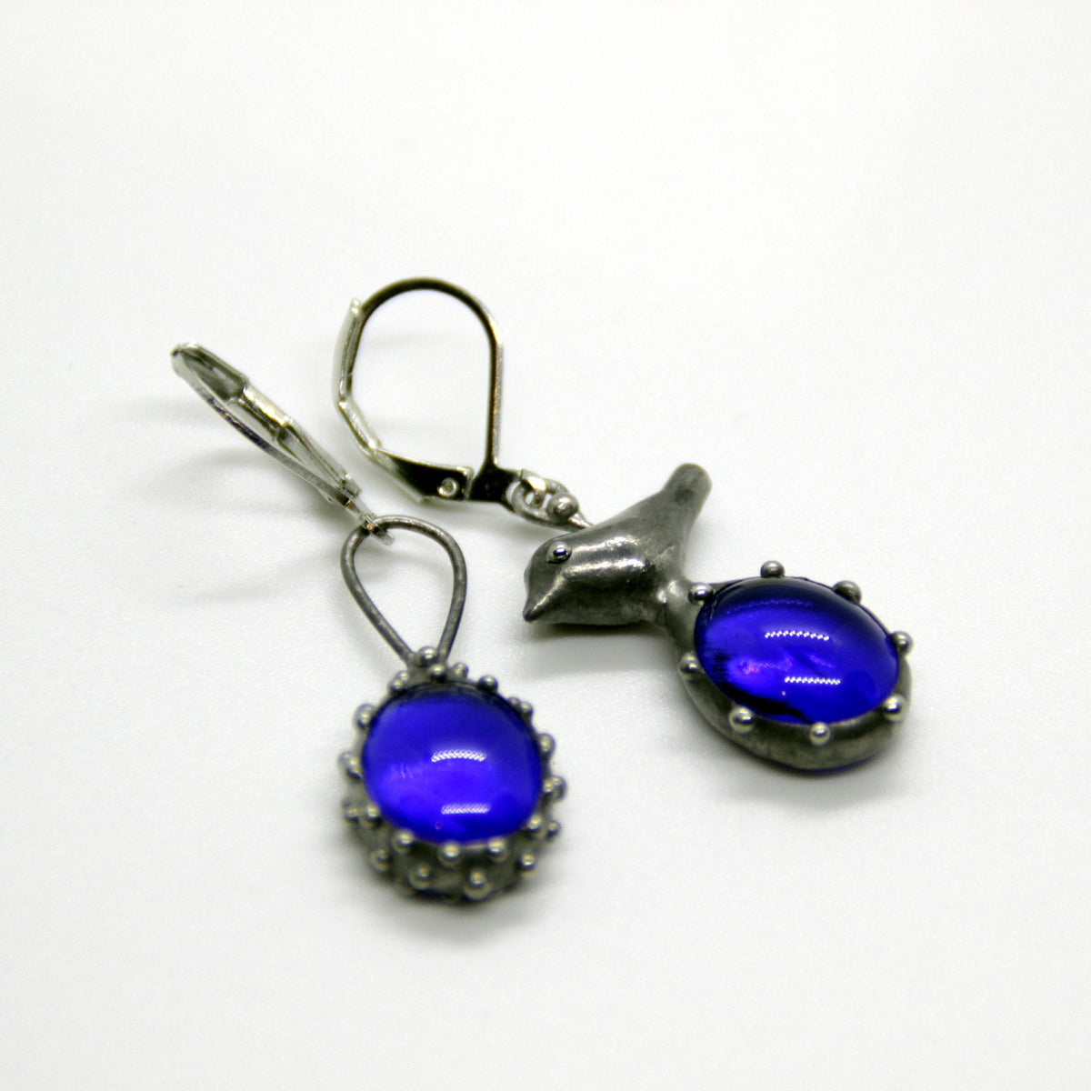 Blue Glass Asymmetrical Bird Earrings – Silver Tone