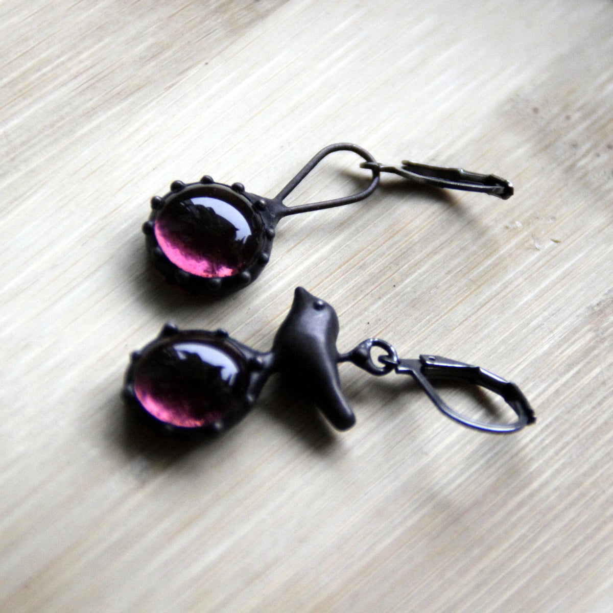 Purple Glass Asymmetrical Bird Earrings – Blackened Copper
