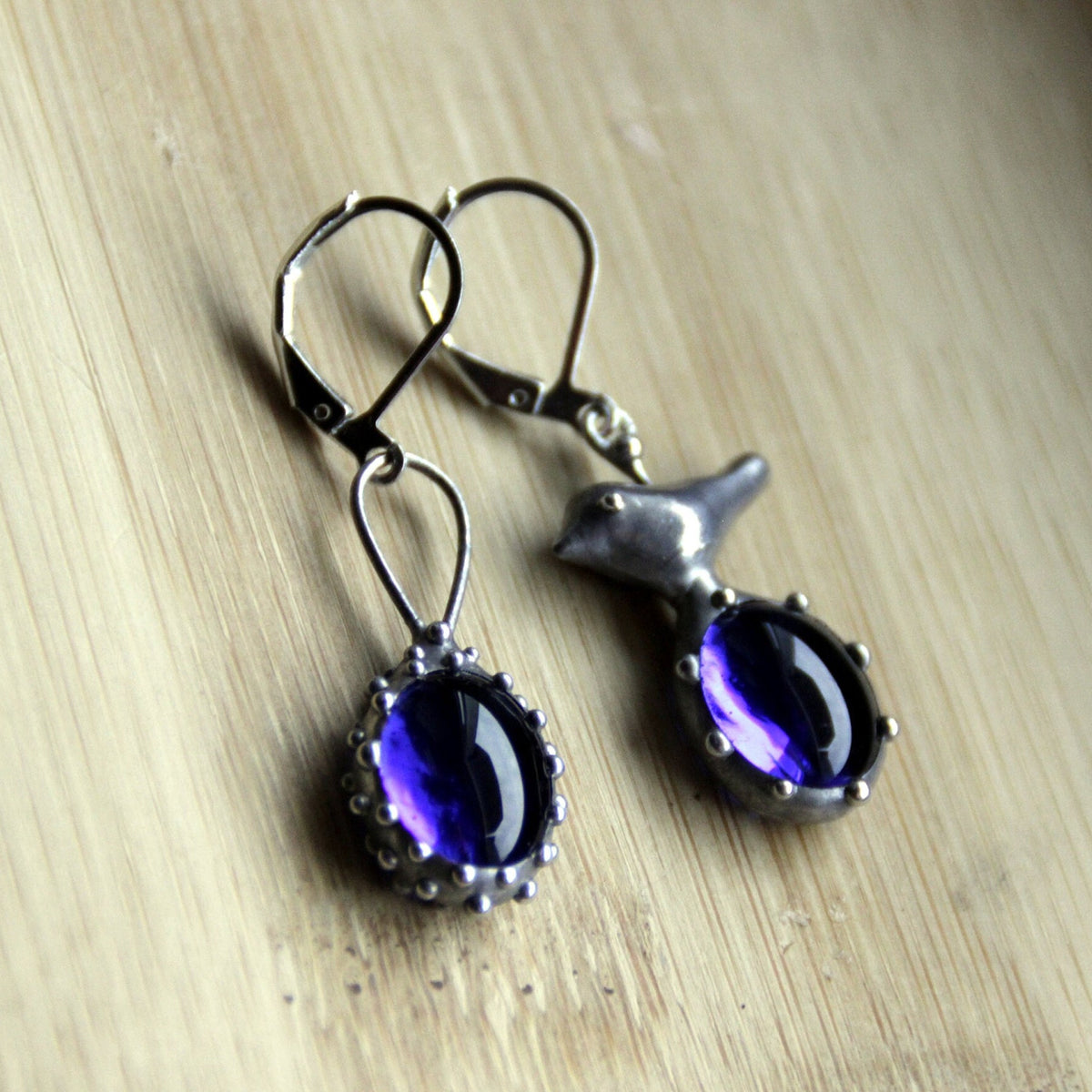 Blue Glass Asymmetrical Bird Earrings – Silver Tone