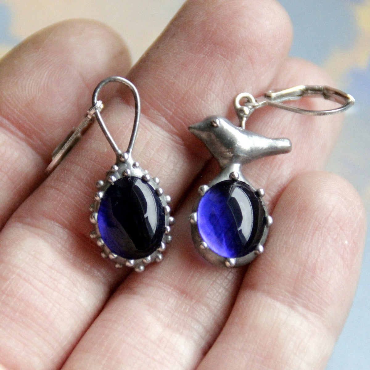 Blue Glass Asymmetrical Bird Earrings – Silver Tone