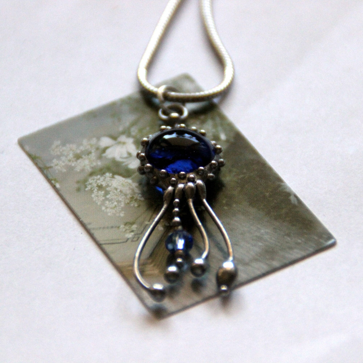 Blue Glass Jellyfish Necklace – Silver Tone