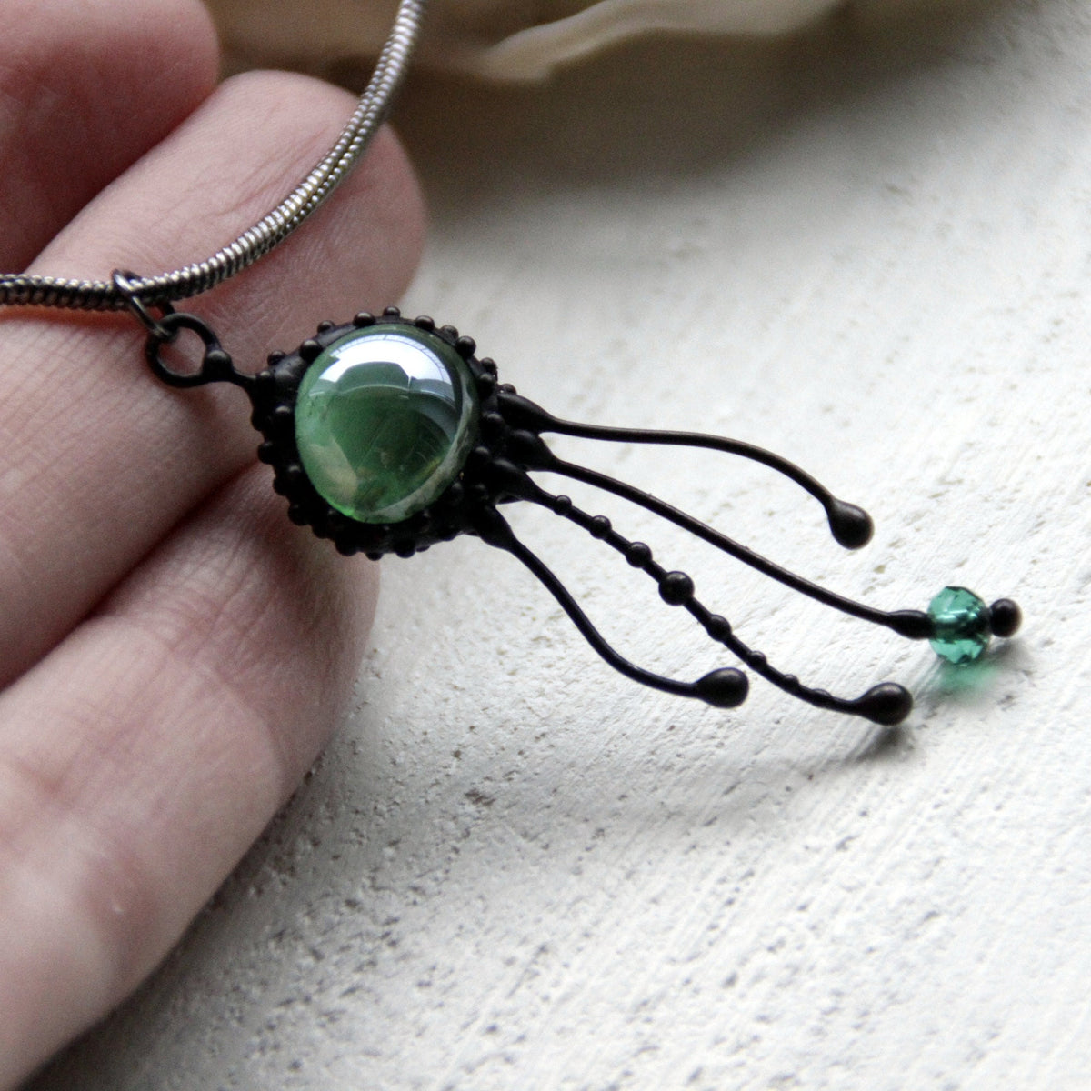 Green Glass Jellyfish Pendant – Blackened Copper
