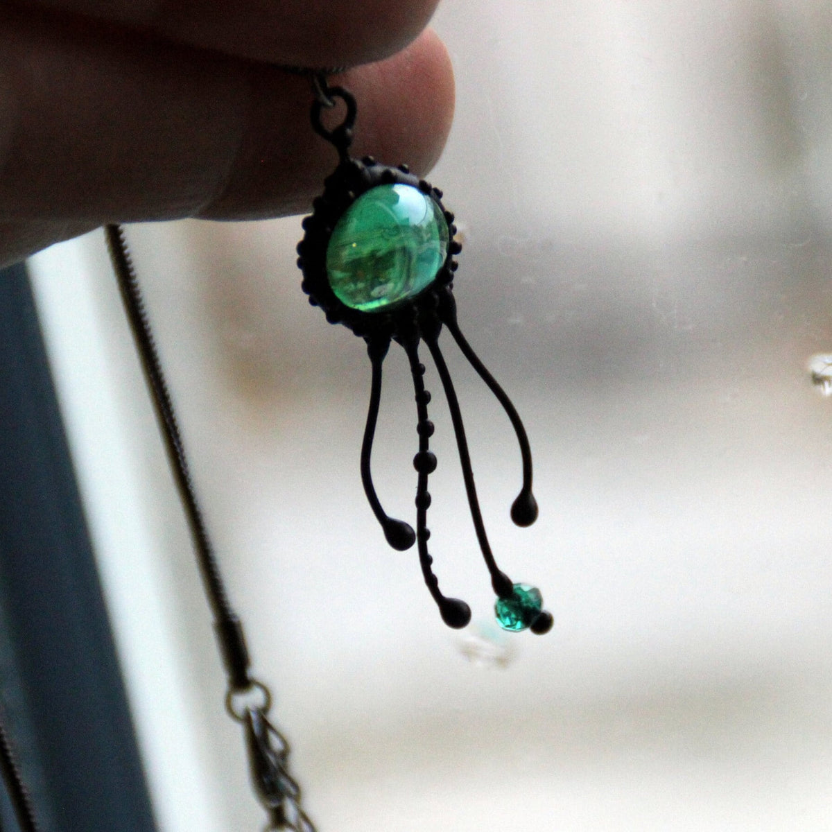 Green Glass Jellyfish Pendant – Blackened Copper