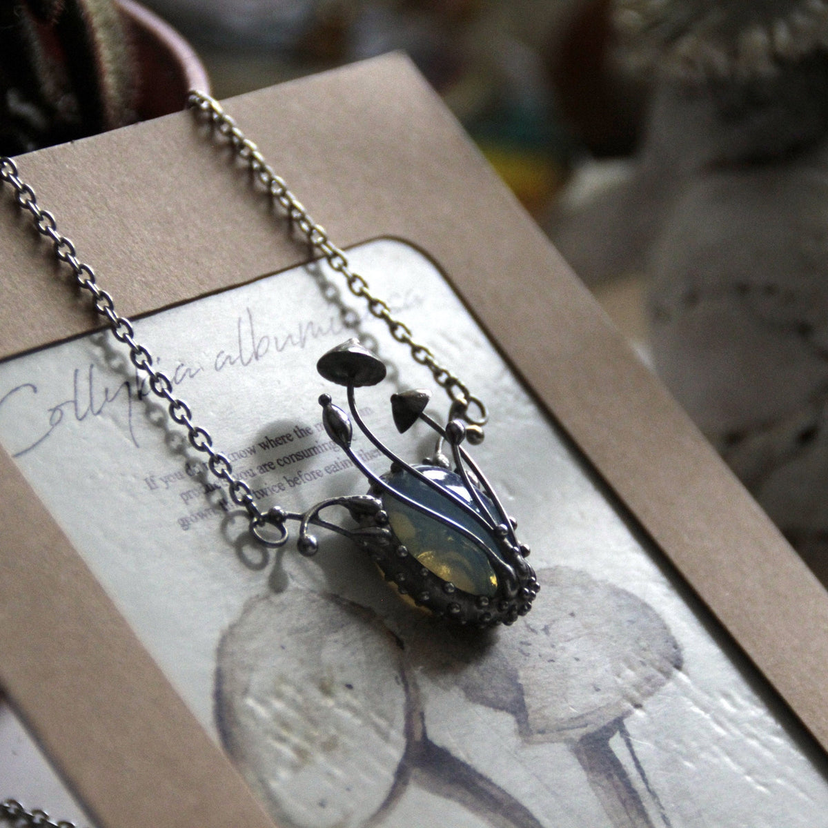 Oval Blue Glass Mushroom Pendant – Silver Tone