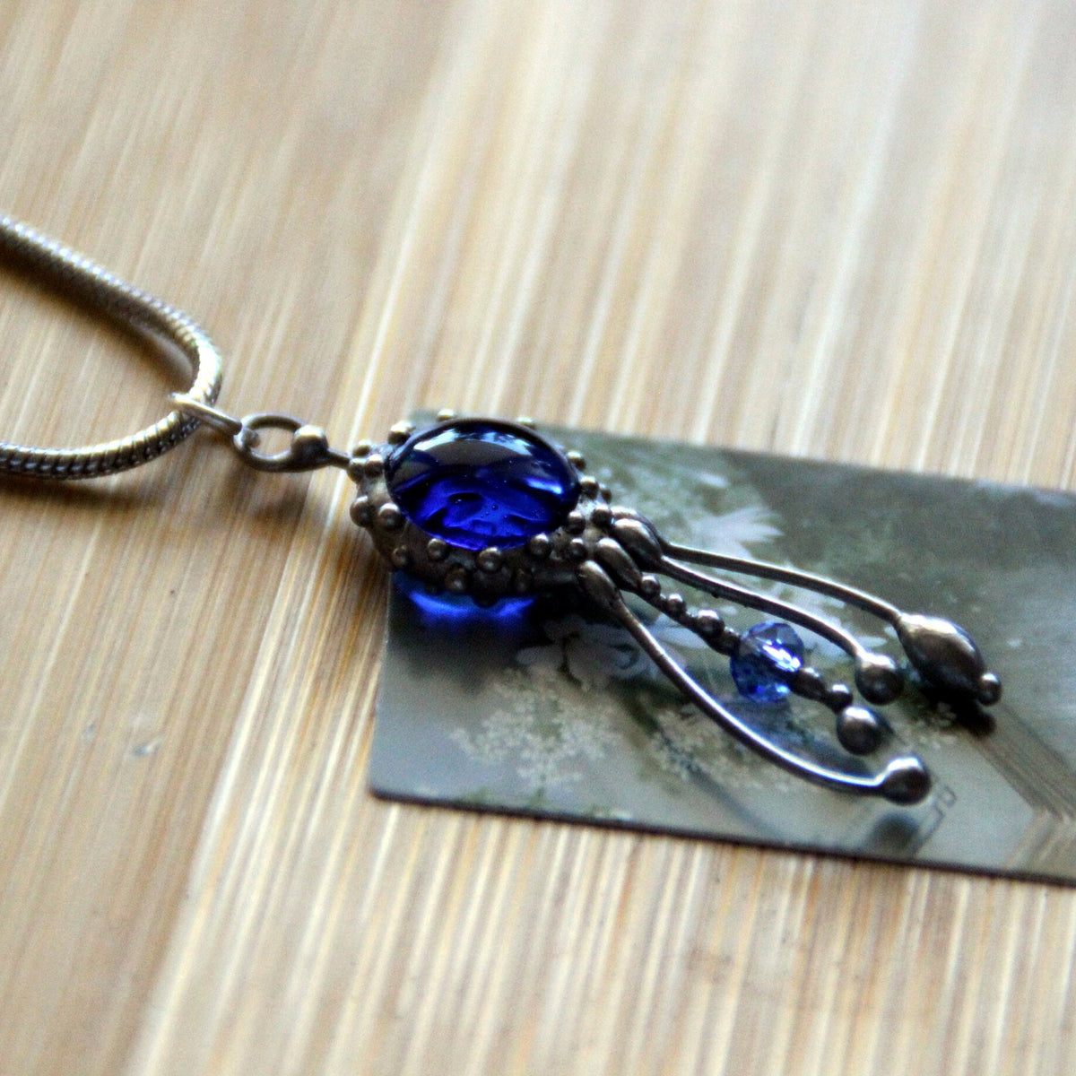 Blue Glass Jellyfish Necklace – Silver Tone