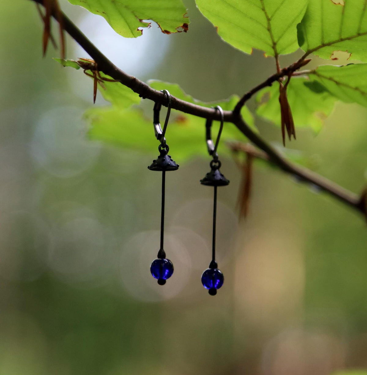 Blue Glass Amanita Mushroom Earrings – Blackened Copper