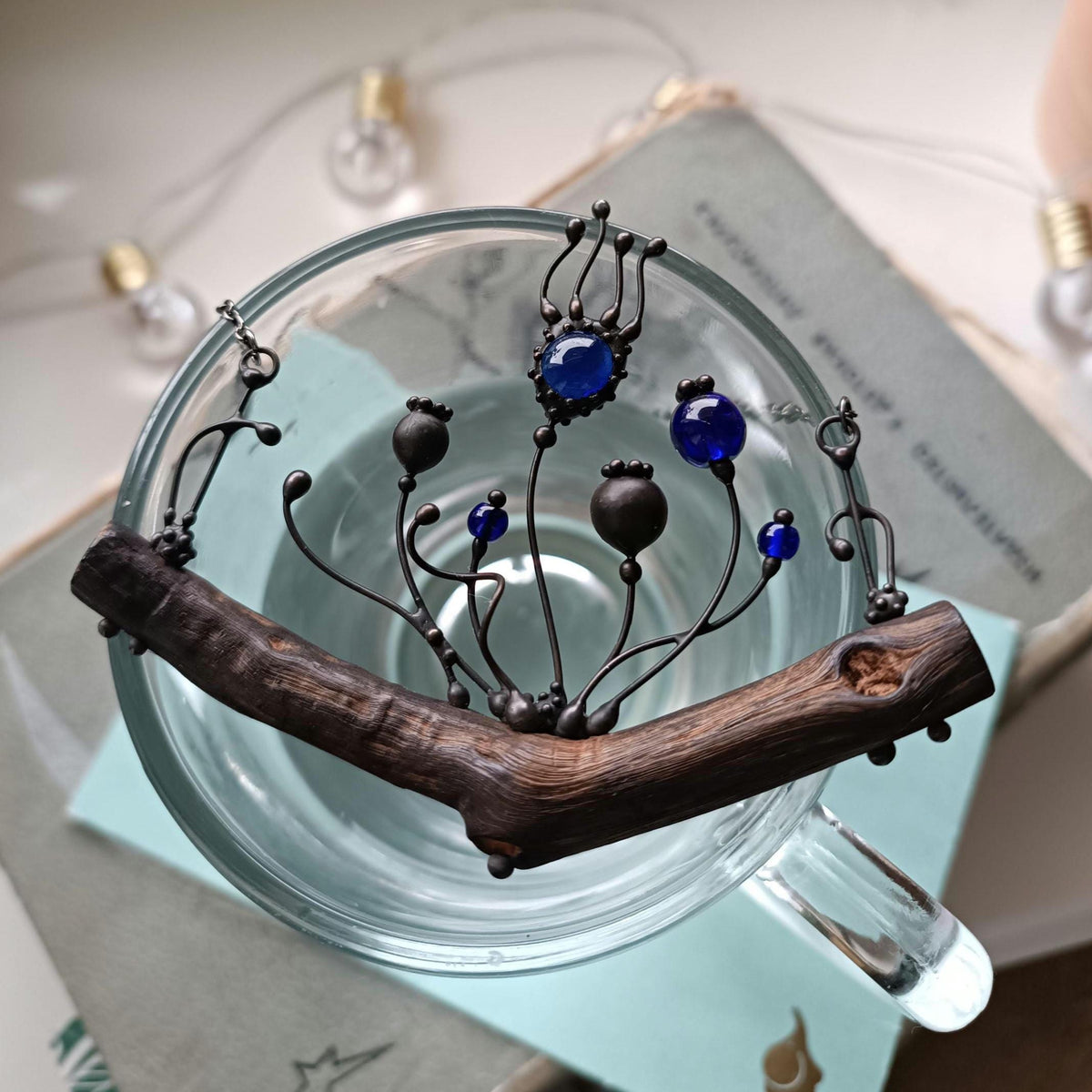 Blue Glass Poppy Necklace on Oak Branch – Blackened Copper