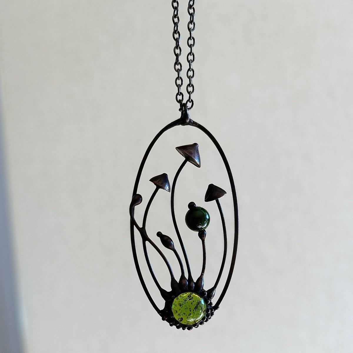 Green Glass Mushroom Necklace – Blackened Copper Oval Forest Pendant – Psychedelic Botanical