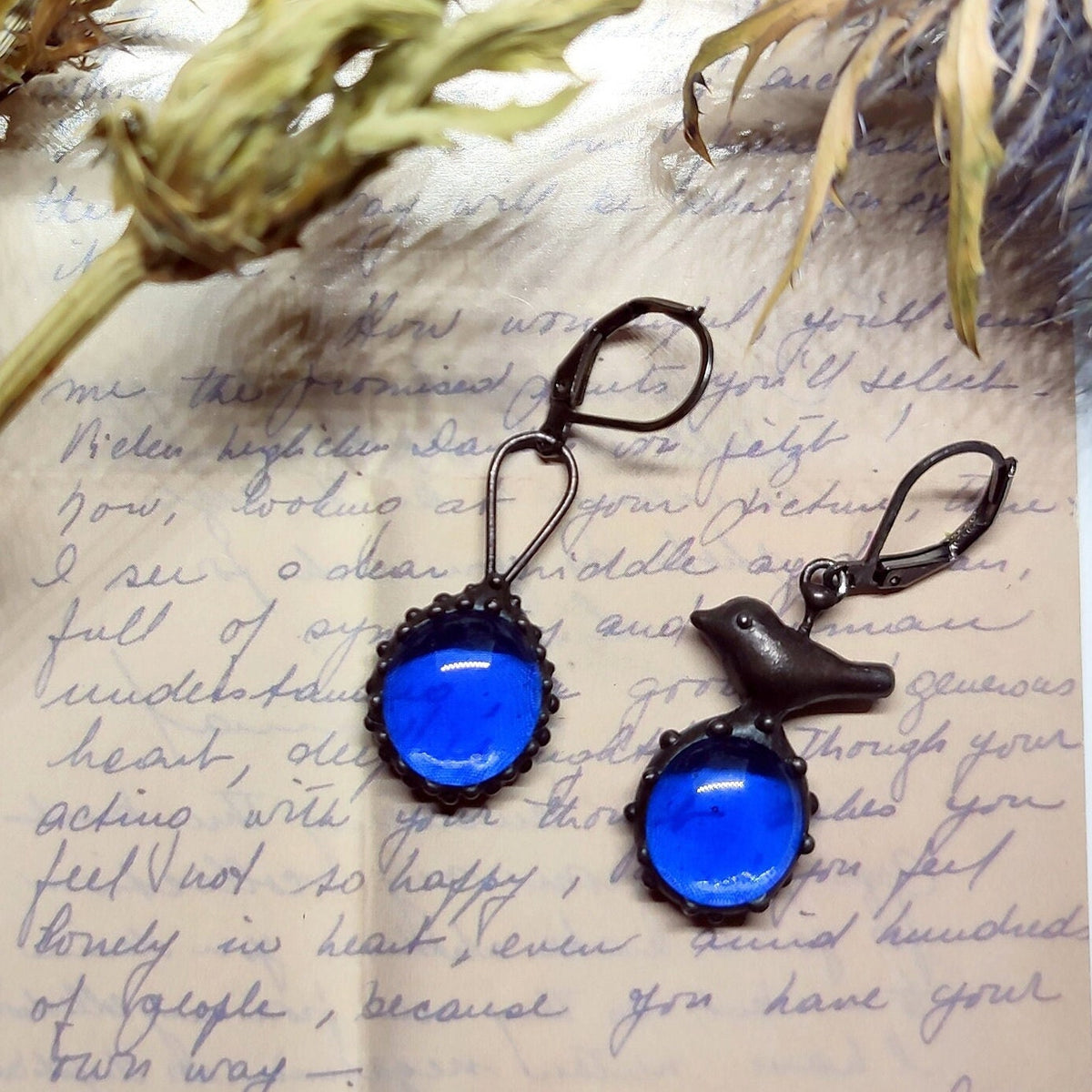 Cobalt Blue Glass Asymmetrical Bird Earrings – Blackened Copper