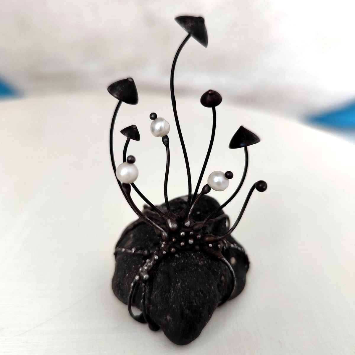 White Pearl Mushroom Sculpture on Baltic Sea Stone – Blackened Copper