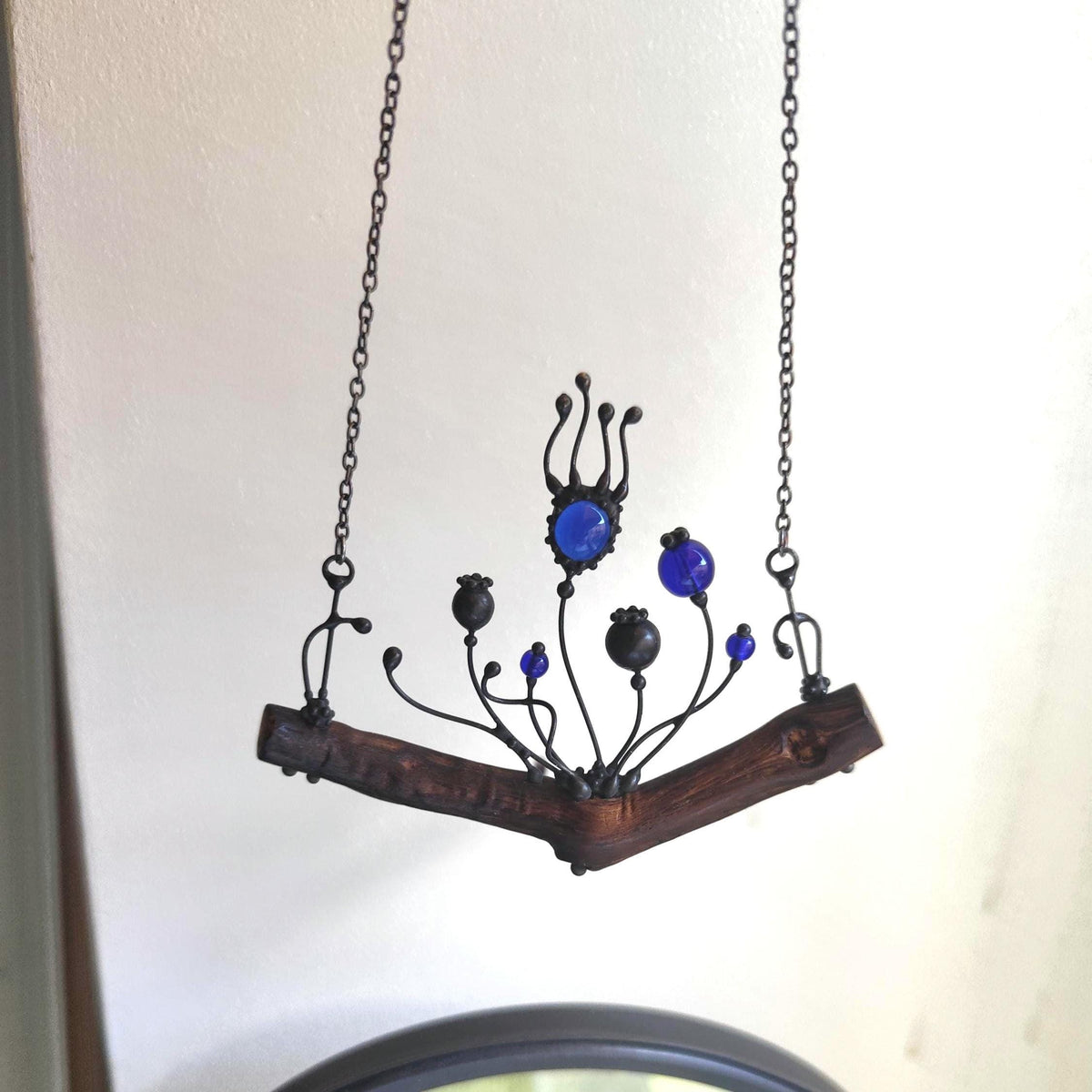 Blue Glass Poppy Necklace on Oak Branch – Blackened Copper