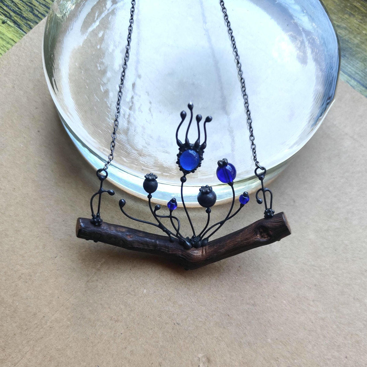 Blue Glass Poppy Necklace on Oak Branch – Blackened Copper