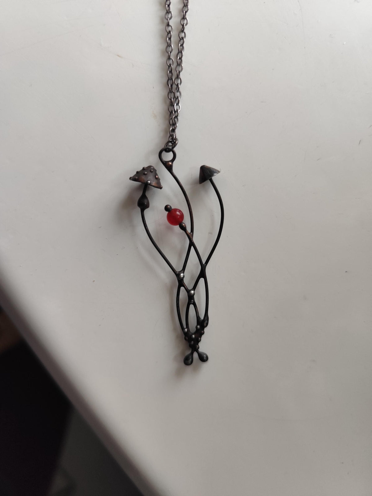 Mushroom Necklace with Red Bead – Blackened Copper